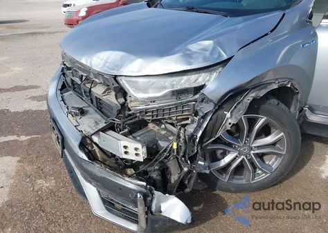 2021 Honda Cr-V Hybrid Touring from USA, damaged, VIN 7FART6H98ME014812